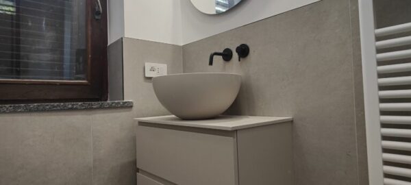 Impianti idrici e sanitari-lavabo-rubinetto-termosifone verticale-Bardelli impianti a Busto Arsizio